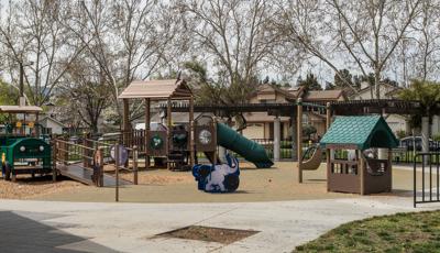 safari-themed PlayBooster® play structure in San Jose, California, for ages 5 to 12. The custom nature-inspired playground, is incorporating Recycled Wood-Grain panels and roofs. Ramps have been included to make the experience accessible.