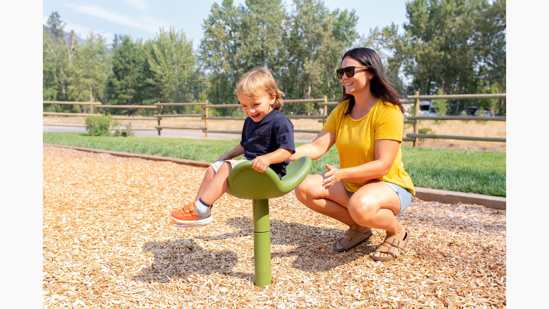 Mother and son playing on E-pod seat