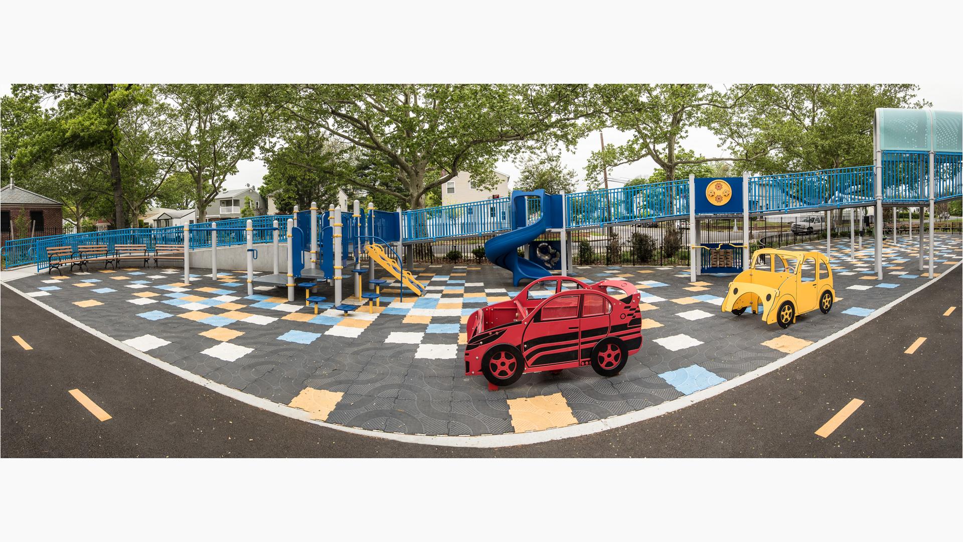 Laurelton West Playground Laurelton, NY features The ramped play structure delivers climbers, playground slides and sensory play panels, plus car-themed structures.