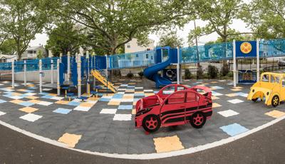 Laurelton West Playground Laurelton, NY features The ramped play structure delivers climbers, playground slides and sensory play panels, plus car-themed structures.