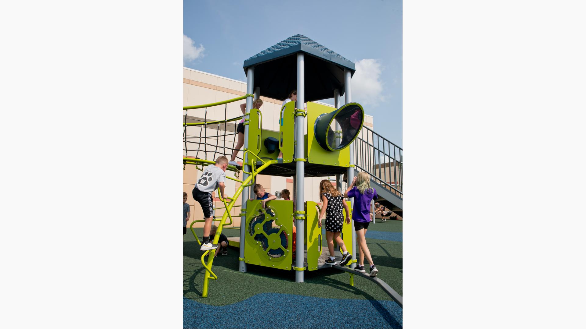 Kids playing on play structure