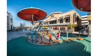 Kids running on Wobble Pod bouncers and Noodle Pod Steps.