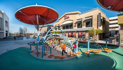 Kids running on Wobble Pod bouncers and Noodle Pod Steps.