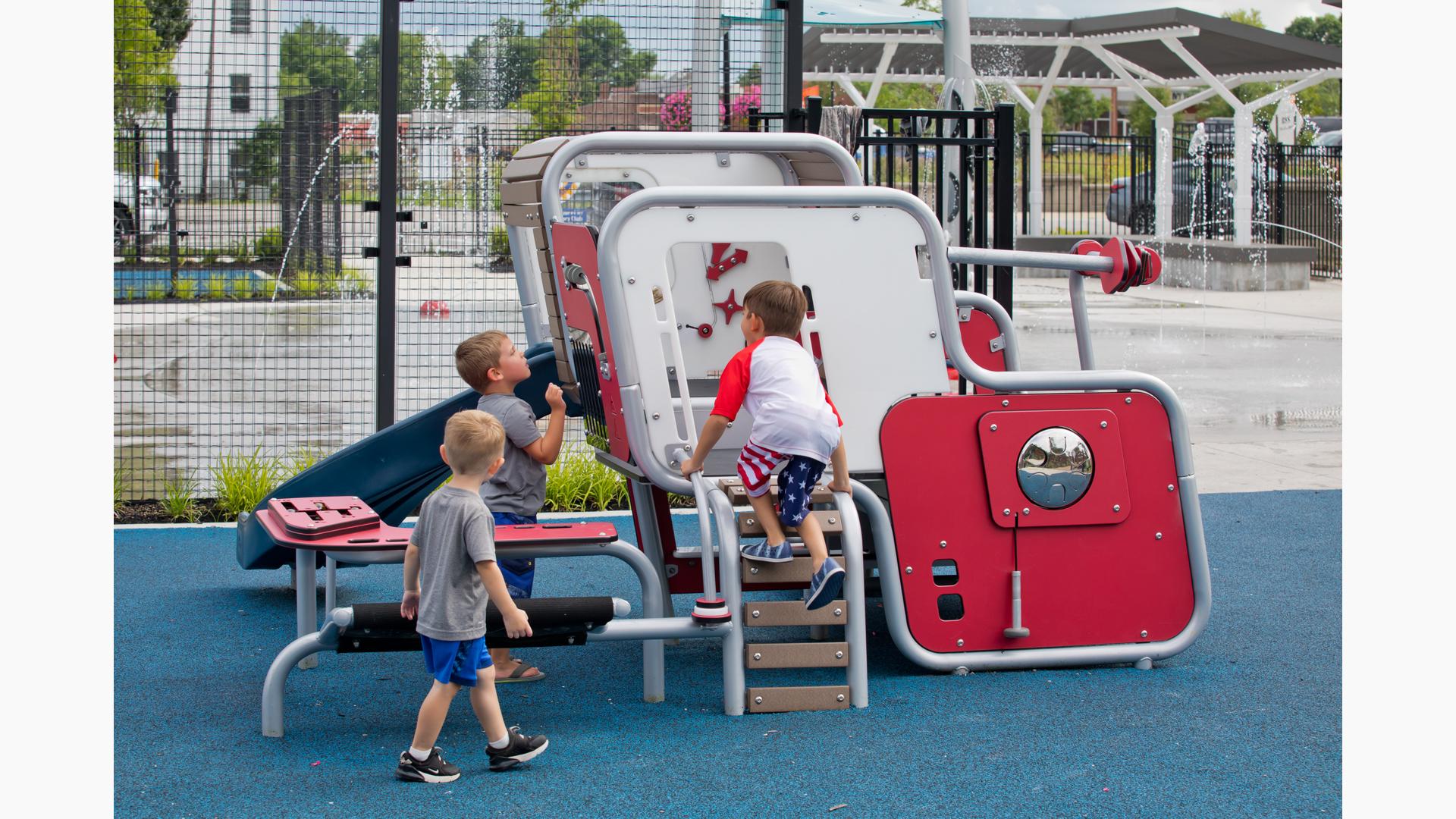 3 boys in playing on 2-5 smartplay structure