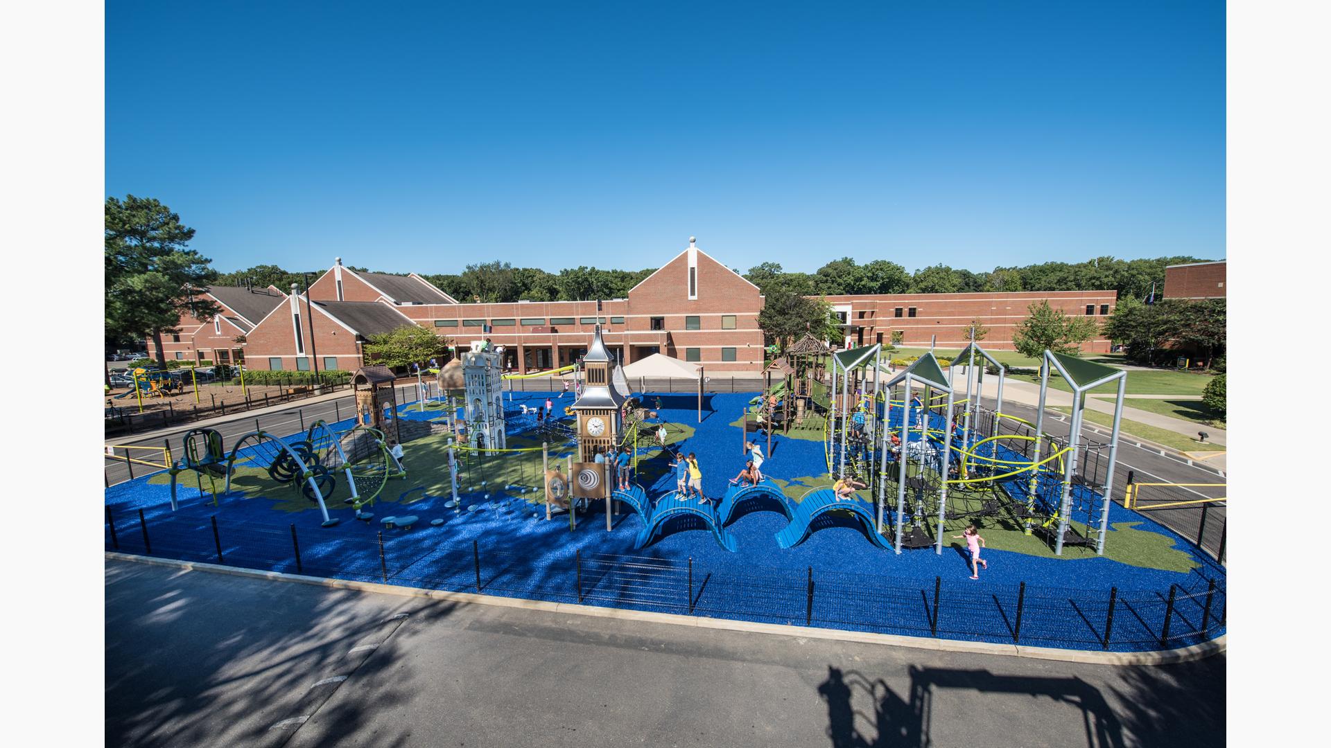 Lausanne Collegiate School, Memphis, TN includes 14 different playstructures that represent a tour of the world on safety surfacing designed to mimic a world map. The playground includes the ZipKrooz™, a playground zip line and climbable replicas of Big Ben, the Eiffel Tower and the Taj Mahal.