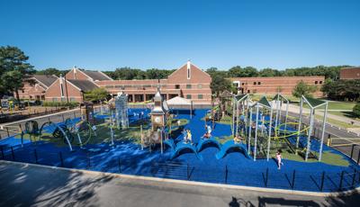 Lausanne Collegiate School, Memphis, TN includes 14 different playstructures that represent a tour of the world on safety surfacing designed to mimic a world map. The playground includes the ZipKrooz™, a playground zip line and climbable replicas of Big Ben, the Eiffel Tower and the Taj Mahal.