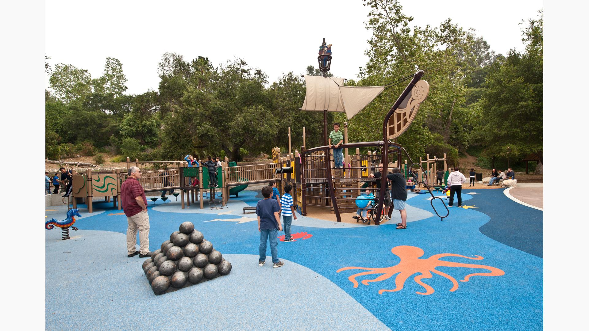 Kids of all abilities play on this Pirate-themed play structure. Filled with ramps, all children can have adventures.