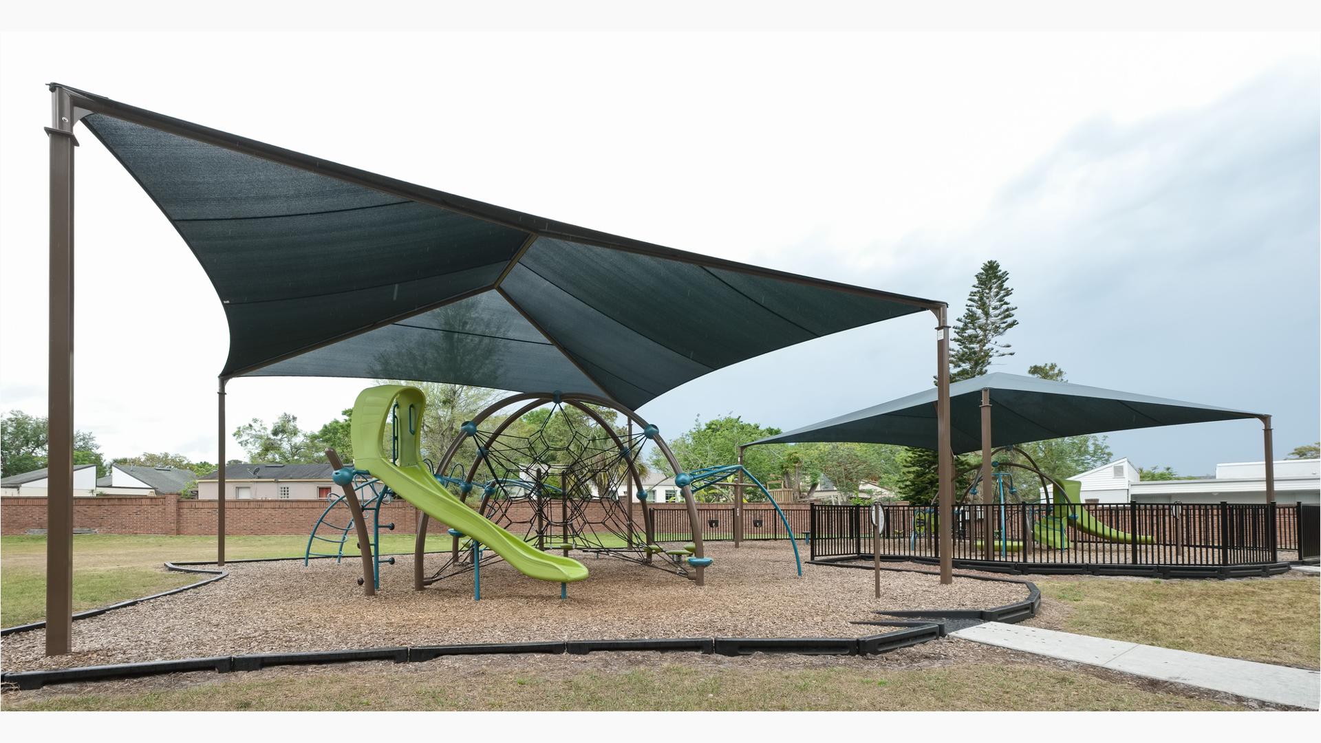 Moss Park, Winter Springs, FL. An Eclipse® Net Plus playground includes a Ring Tangle® Climber, Rush™ Slide, Blender™ Spinner and more.