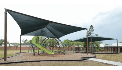 Moss Park, Winter Springs, FL. An Eclipse® Net Plus playground includes a Ring Tangle® Climber, Rush™ Slide, Blender™ Spinner and more.