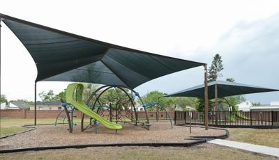 Moss Park, Winter Springs, FL. An Eclipse® Net Plus playground includes a Ring Tangle® Climber, Rush™ Slide, Blender™ Spinner and more.