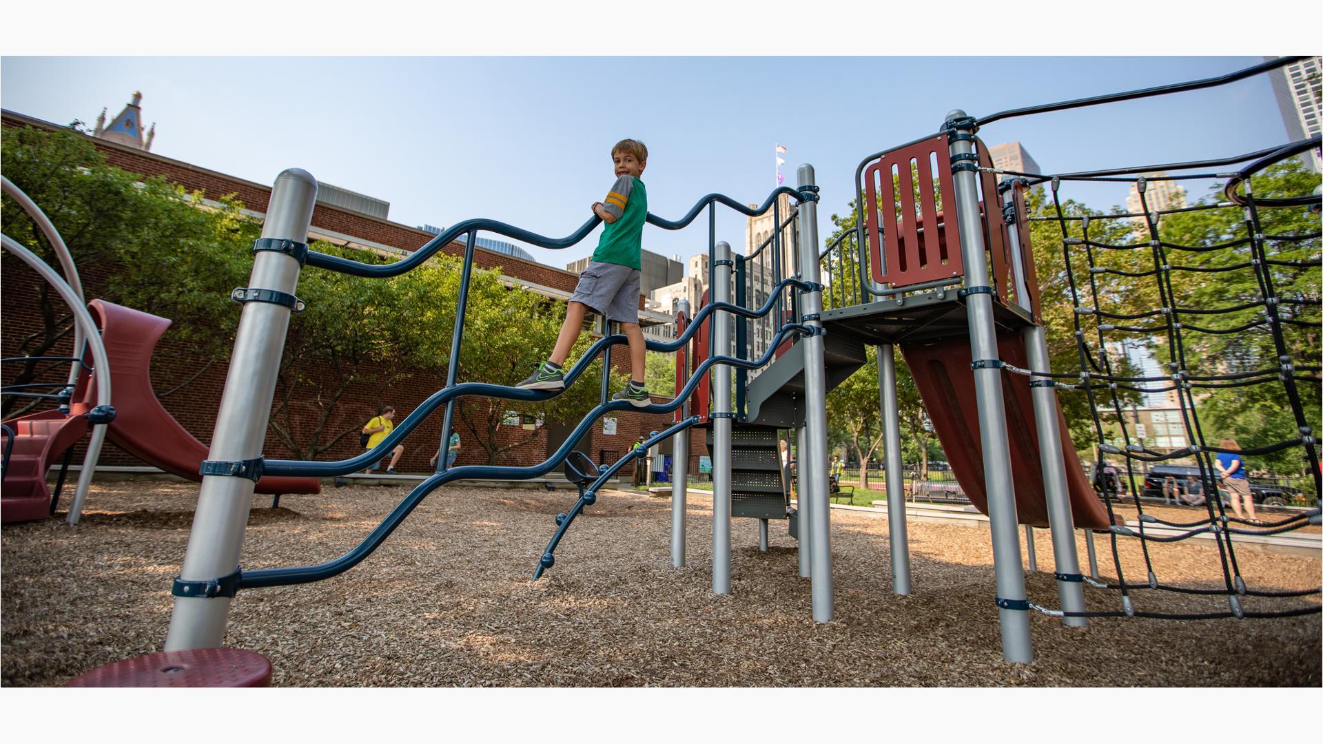 Boy standing on climber