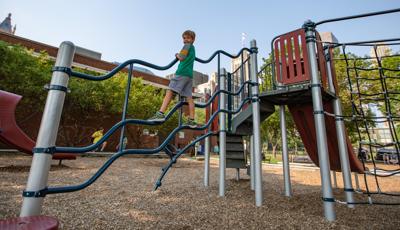 Boy standing on climber