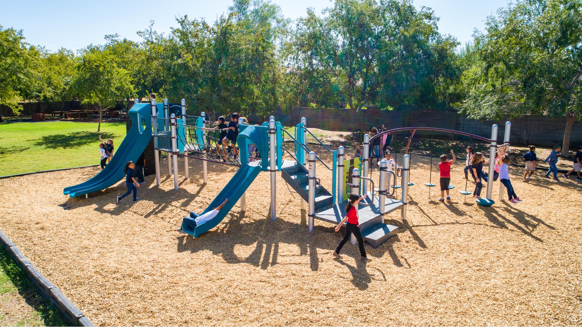 Liberty Arts Academy Mesa, AZ features a PlayBooster® play structure with DigiFuse® playground panels. As well as a Curva® and Chill® spinners.