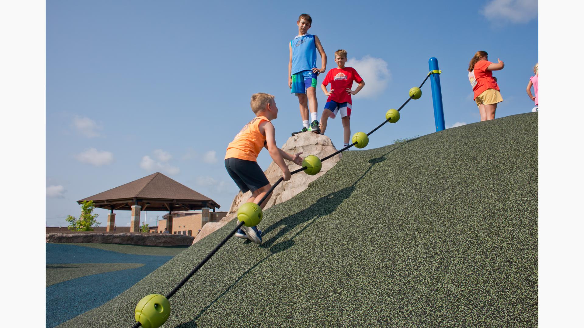 Kids playing up hill