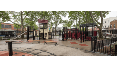 Custom train station sits in the middle of the Bronx. Ramps and overhead events connect the train to the rest of the structure.