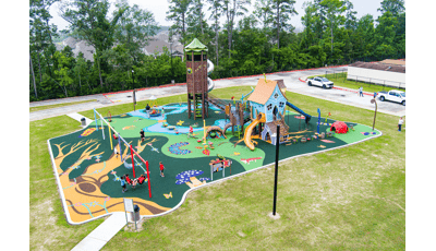 Elevated view of a whimsical nature themed elementary school playground.