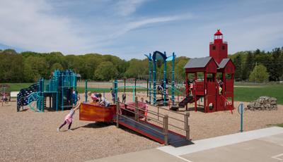 Lakewood Elementary School, Holland, MI. A custom lighthouse-themed PlayBooster® playground.