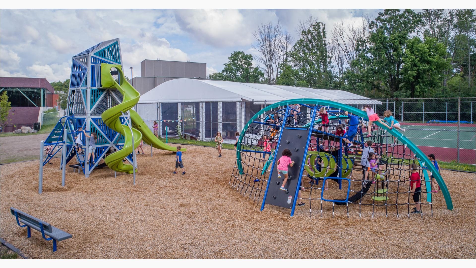 Louis S. Wolk JCC of Rochester
Rochester, NY is made up of a sky-high tower and playground nets. It also features the Double Swoosh Slide® and WhooshWinder® Slide, a Crab Trap®  and O-Zone® ring climber.
