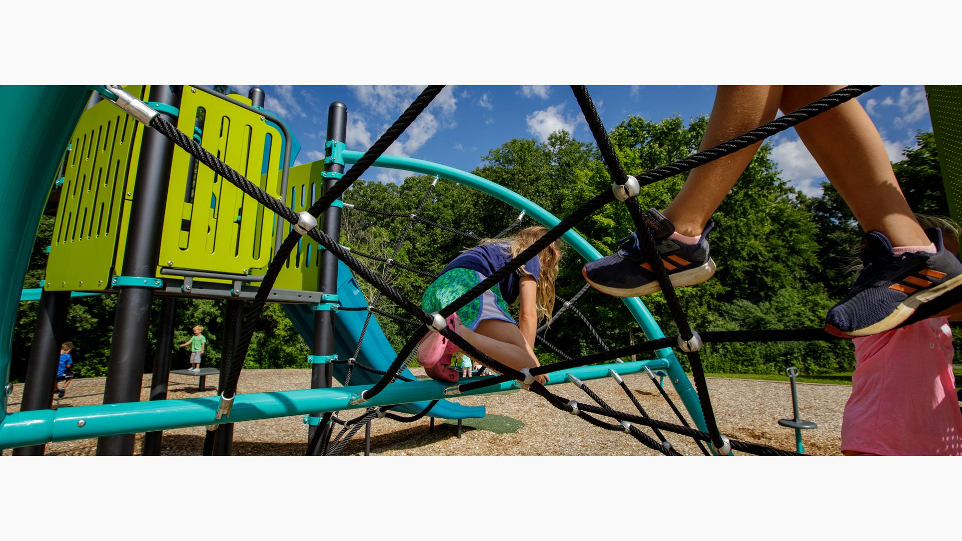 Kids playing on the Flex Climber w/Permalene® Handholds