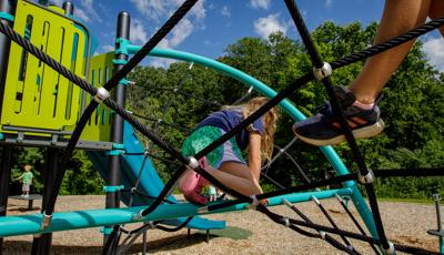 Kids playing on the Flex Climber w/Permalene® Handholds