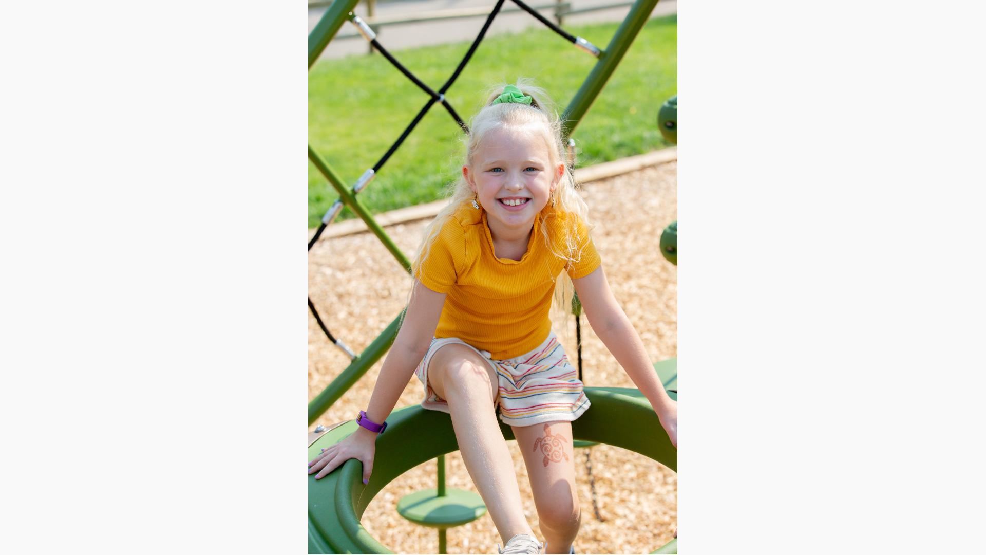 Kid playing on playground