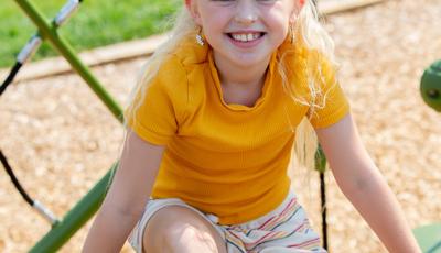 Kid playing on playground
