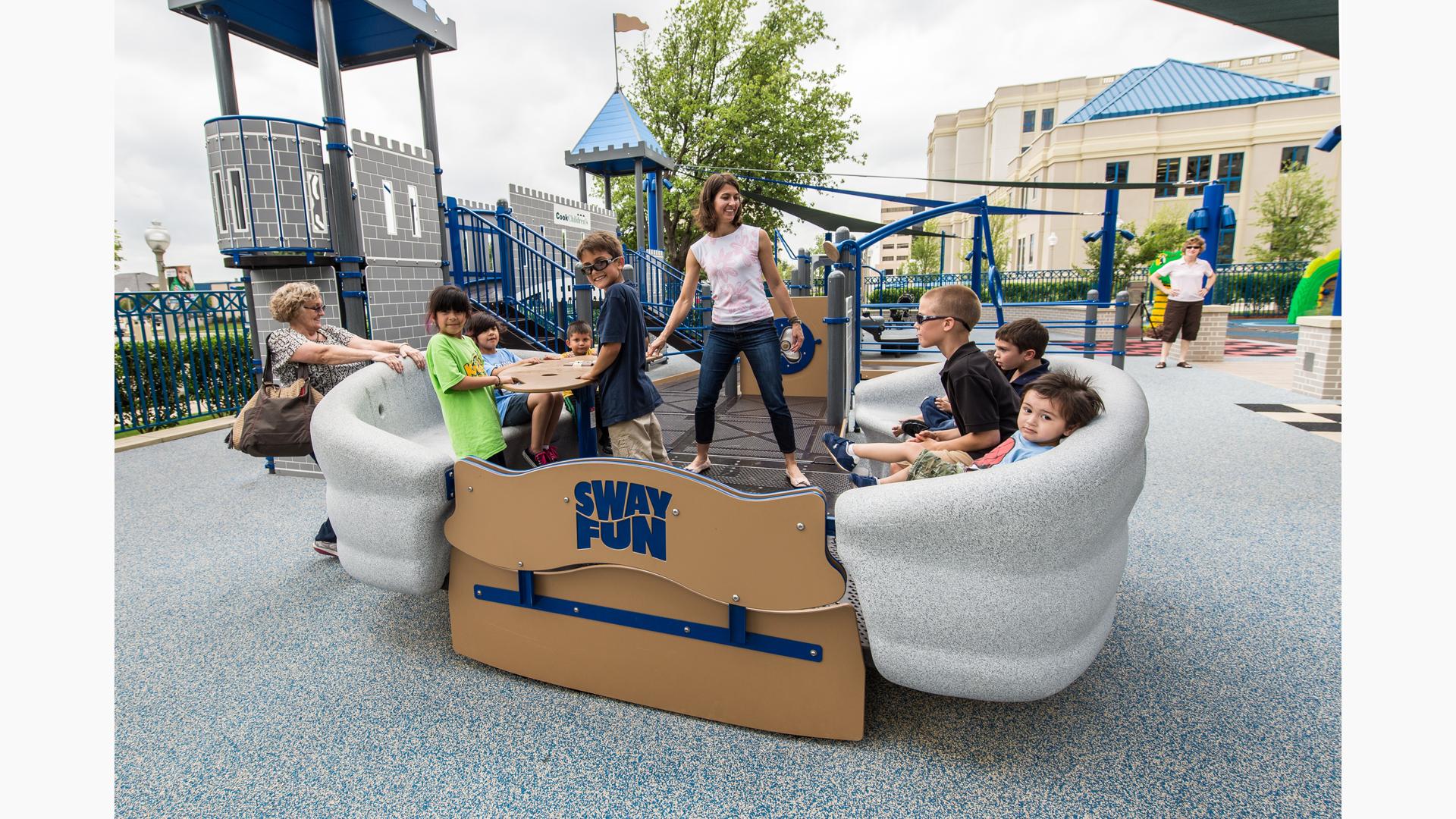 People smiling on Sway Fun® Glider (16")