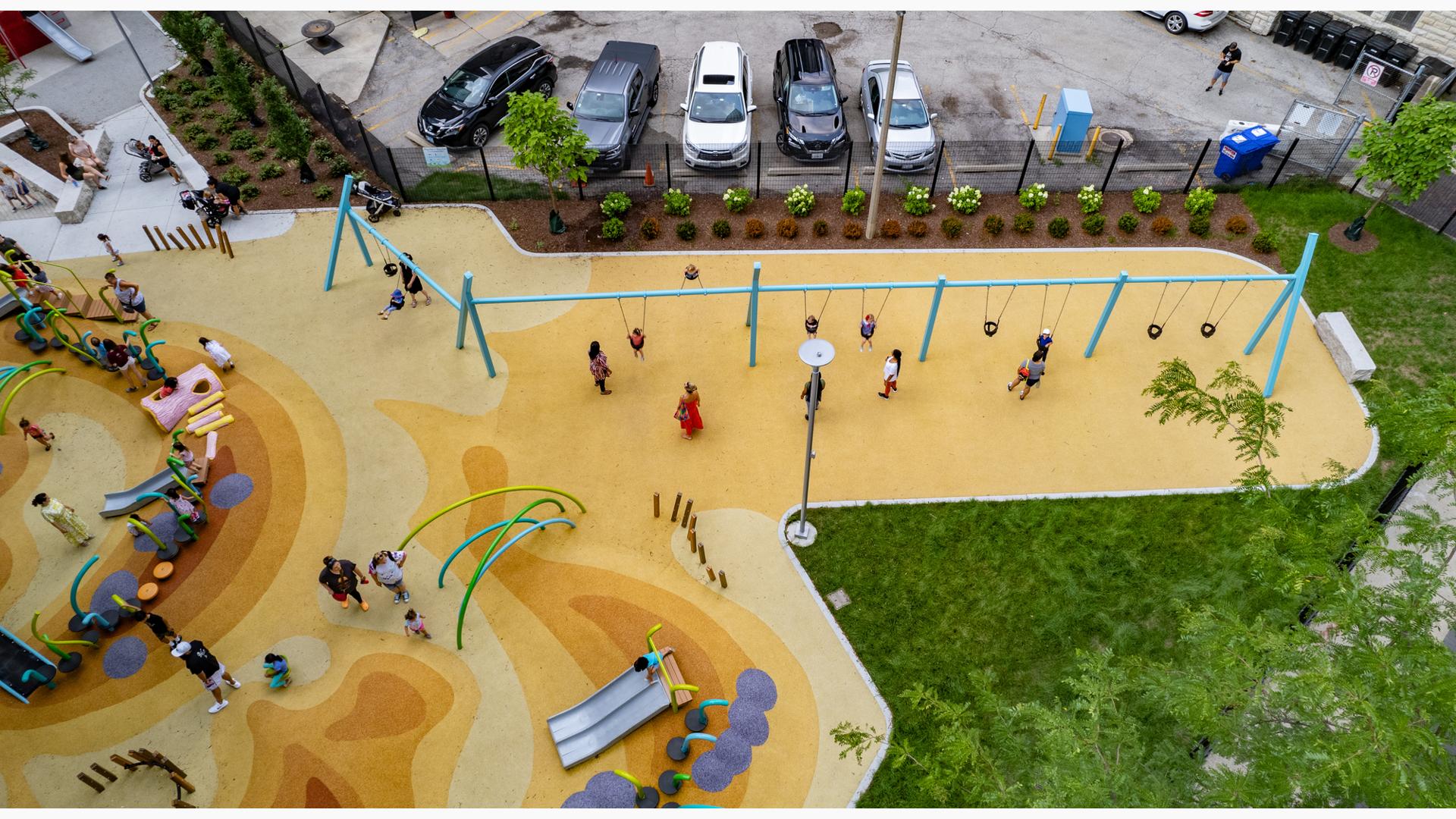 Aerial of swing sets at Seneca Park, Eli M. Schulman Playground