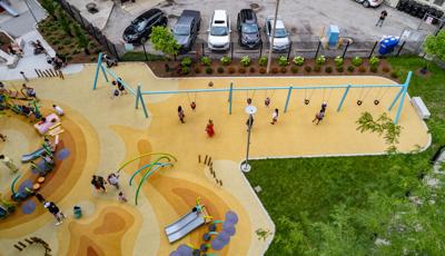 Aerial of swing sets at Seneca Park, Eli M. Schulman Playground