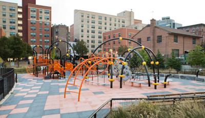 Melrose Park Bronx, NY.  An Evos® playsystem and PlayBooster® play structure linked together.