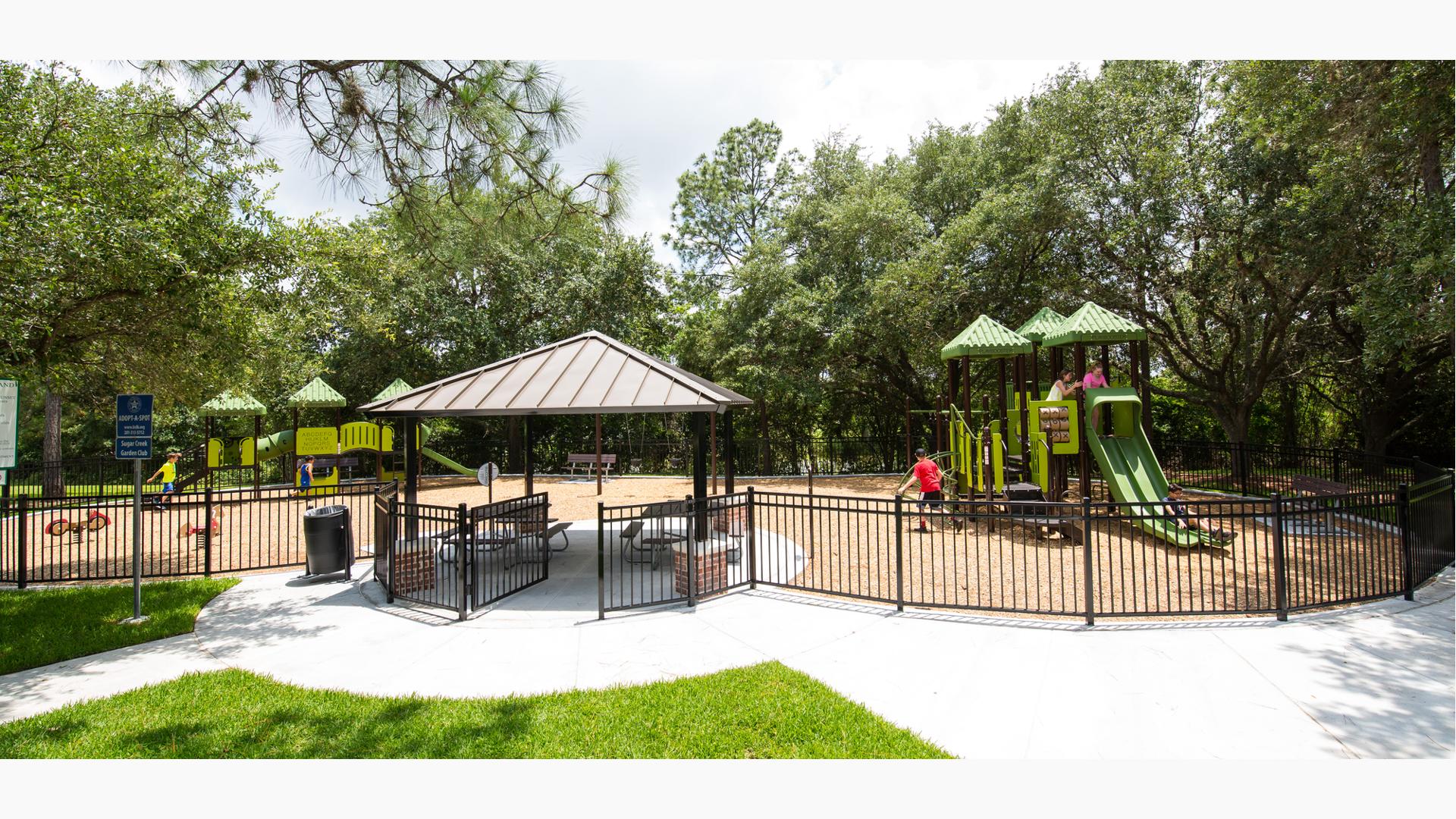 Lonnie Green Park Sugar Land, TX offers a PlayBooster® play structure for ages 5 to 12 and a PlayShaper® play structure for ages 2 to 5 so that the entire family can visit and play. Playground also includes slides, climbers, tunnels and interactive panels.