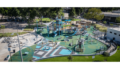 Elevated view of a custom park playground with blue and grey accents.
