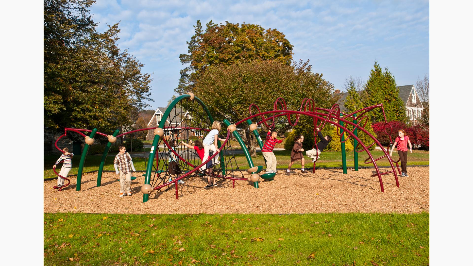 Children climbing on Evos play structure at St. Andrew's School in Rhode Island