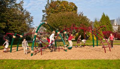 Children climbing on Evos play structure at St. Andrew's School in Rhode Island