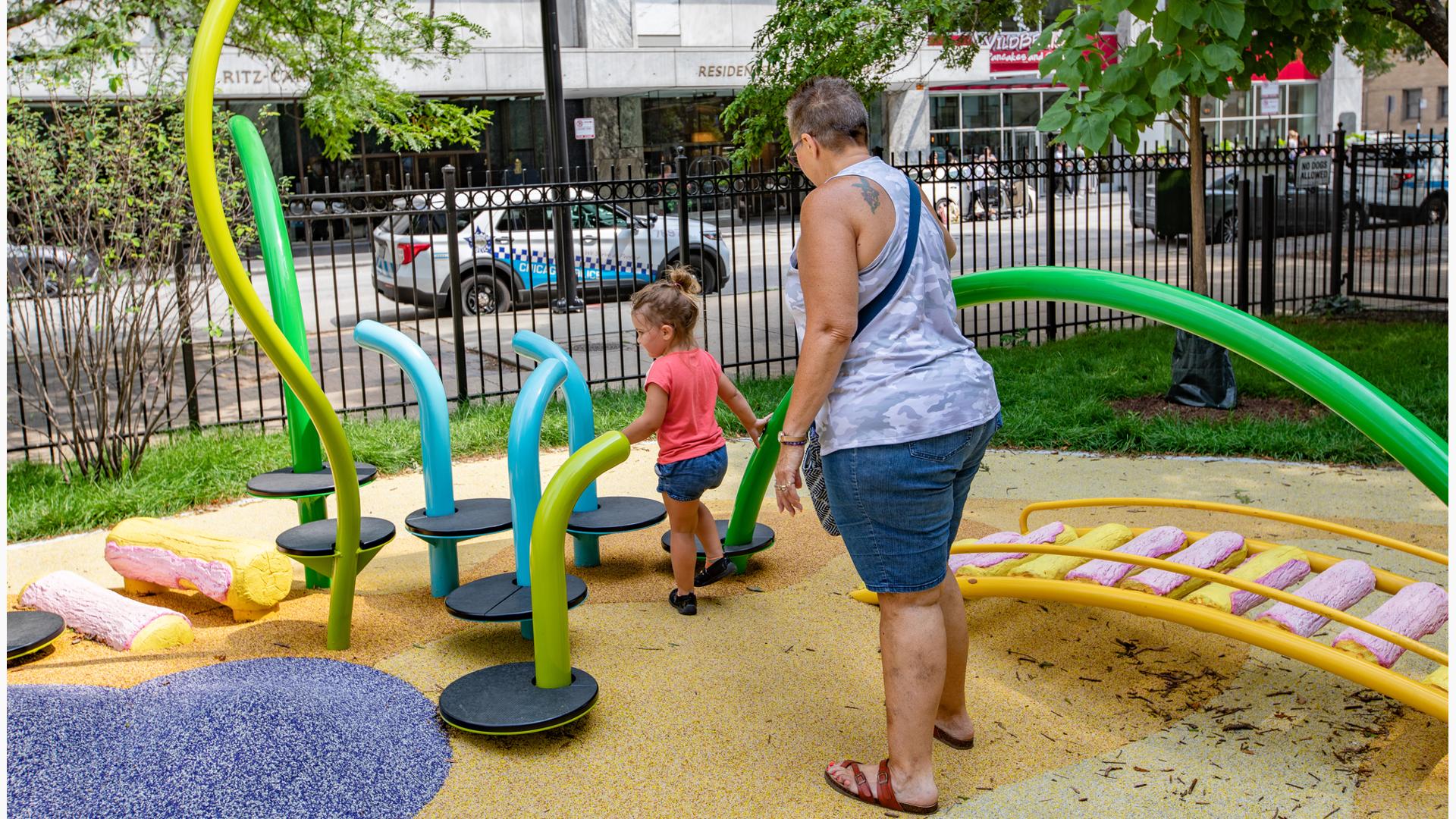 Girl with woman playing on Noodle Pod® Step