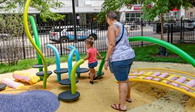 Girl with woman playing on Noodle Pod® Step