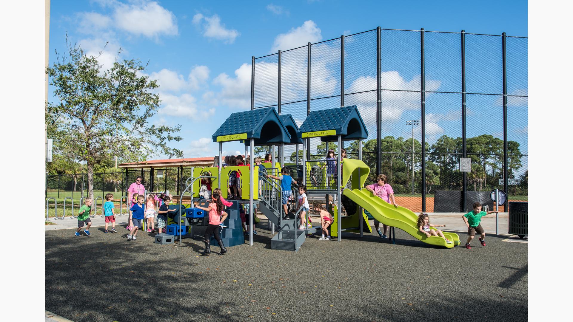 Mirasol Park, in Palm Beach Gardens, FL is a PlayShaper® playstructure featuring Wood Plank Wiggle Ladder,  and ABC Climber.