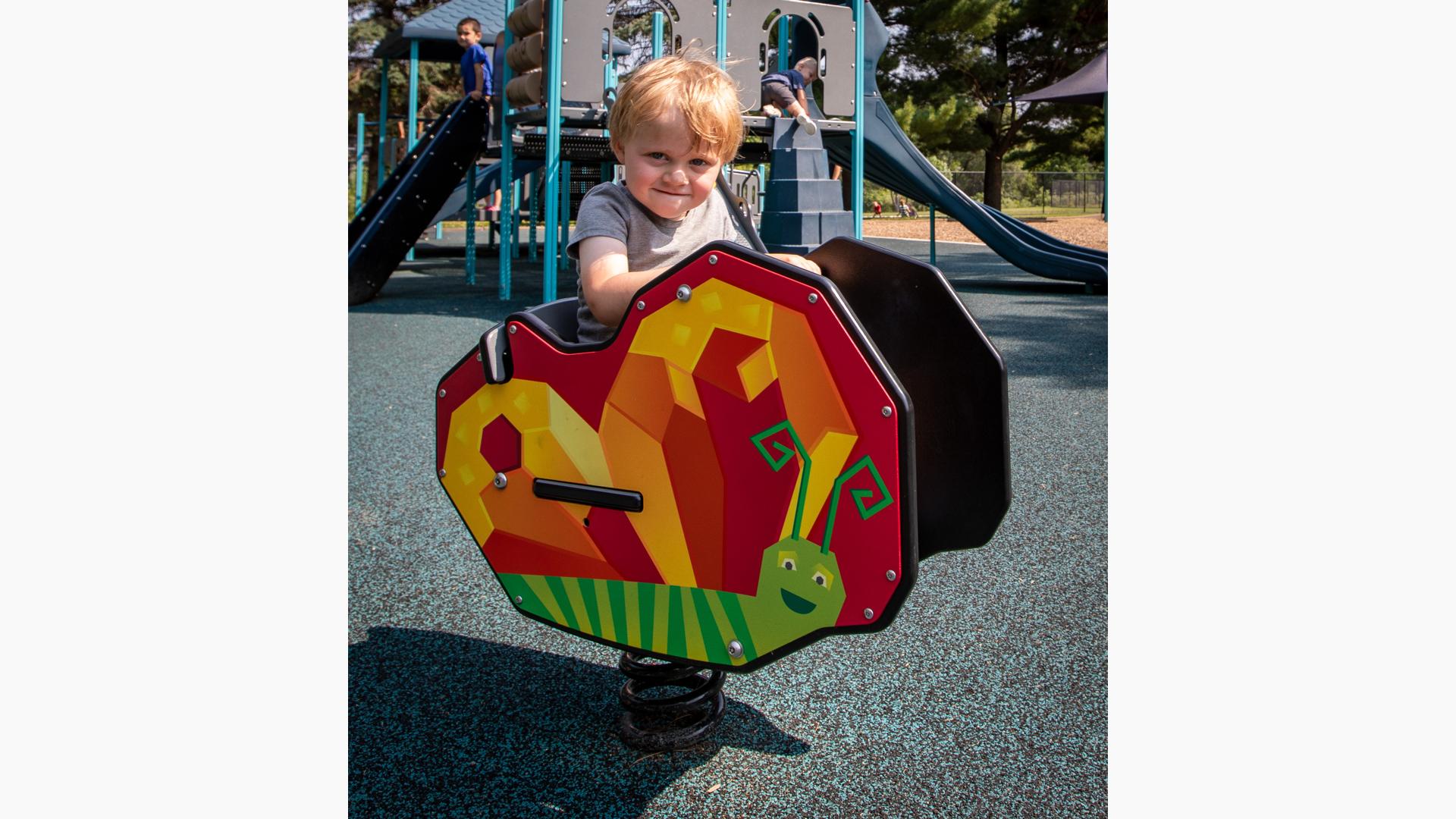 Boy riding DigiRider® Butterfly