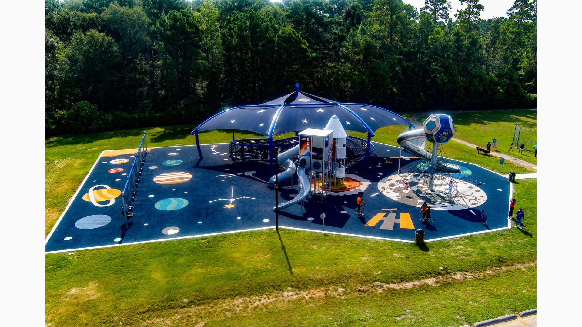Elevated view of park space themed playground.