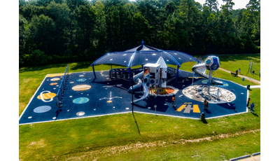 Elevated view of park space themed playground.