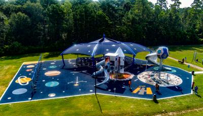 Elevated view of park space themed playground.