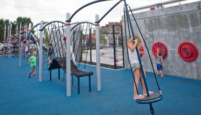 Children playing on motion net structures