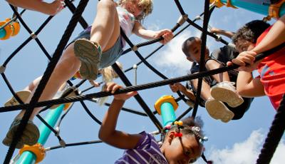 Kids playing in Netplex Climber