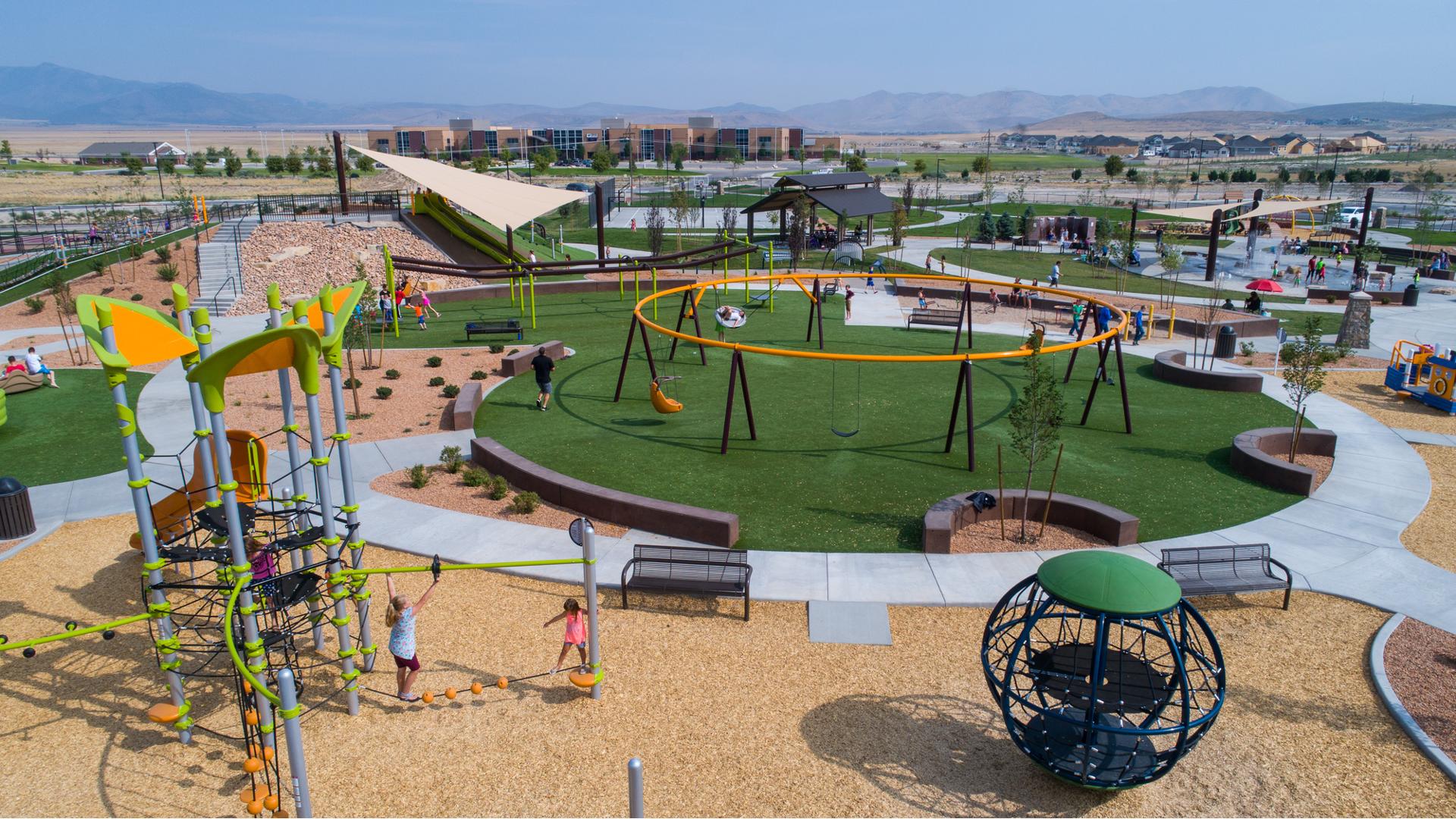 Cory B. Wride Memorial Park features a Netplex® play structure, Global Motion®, Sway Fun® glider as well as a play structure designed for toddlers and preschoolers. Visitors will meet a Mobius®, Aeronet® and AdventureScapes® climbers. And hillside climbers and slides are covered with a SkyWays® shade structure.
