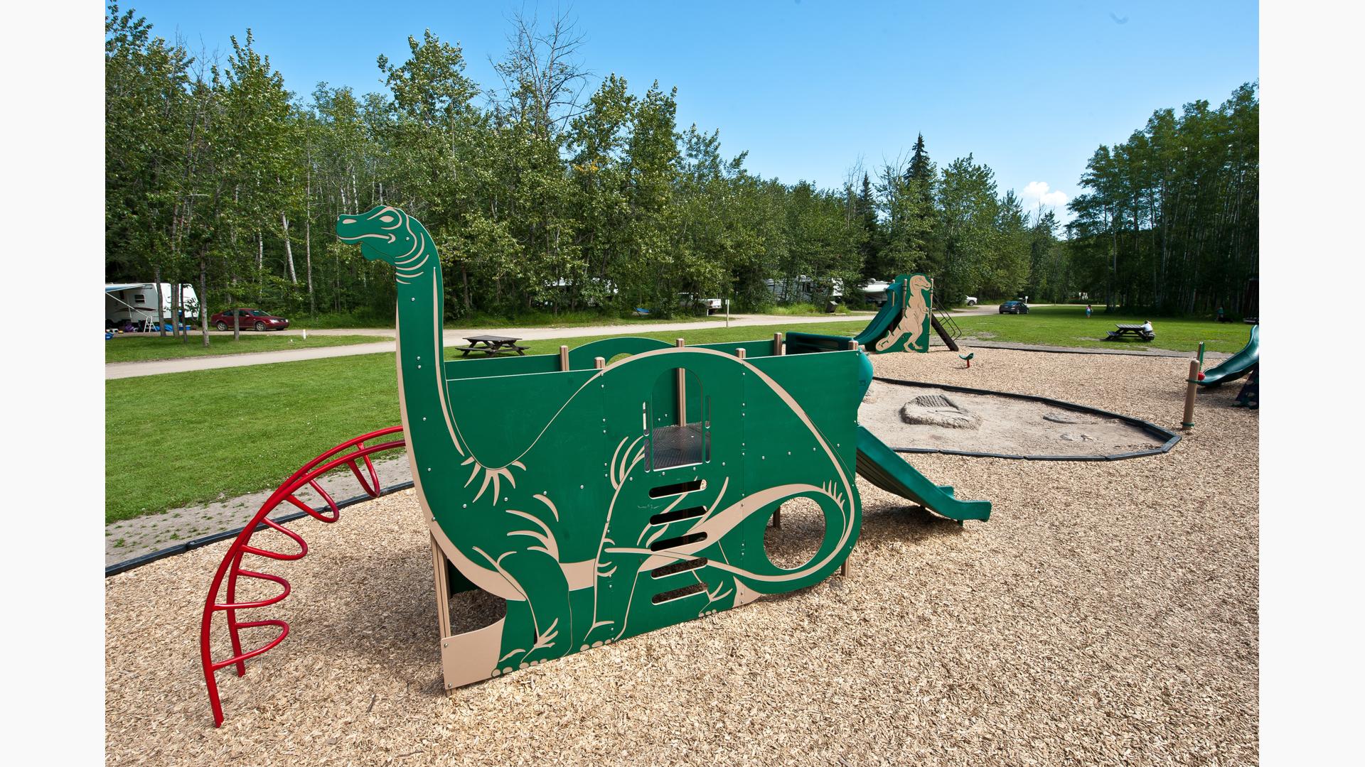 Pipestone Creek Dinosaur Playground – Themed playground