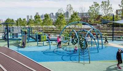 Mayor Thomas M. Menino Park, Charlestown, MA. The playground design was envisioned in the wake of the Boston Marathon bombings, the inclusive playground incorporated a ramped PlayBooster® play structure, embankment slides climbers, and an Evos® play system.