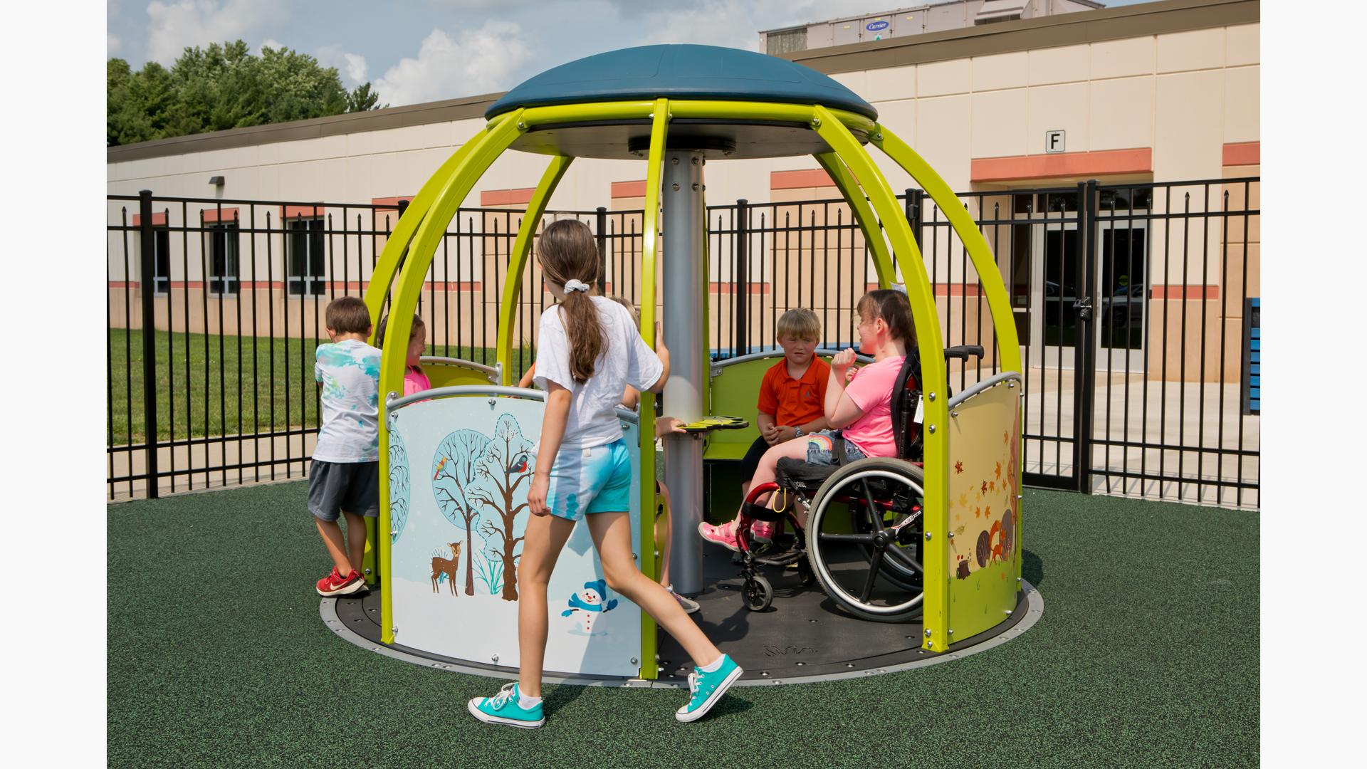 Children playing in We-Go-Round® with DigiFuse® Panels