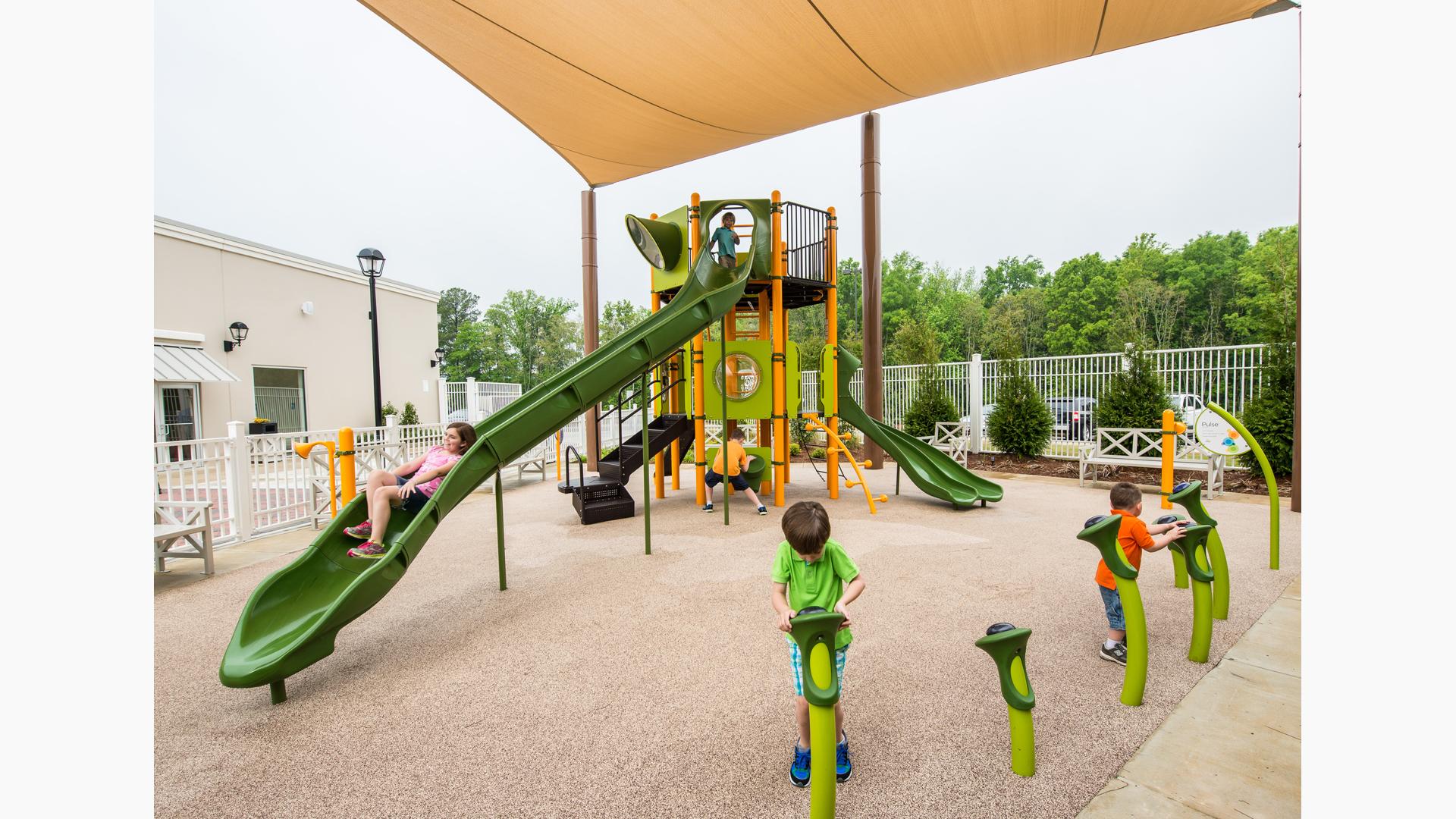 Outlets of Mississippi, Pearl, MS features a PlayOdyssey® Tower along with exciting slide rides and challenging climbers.