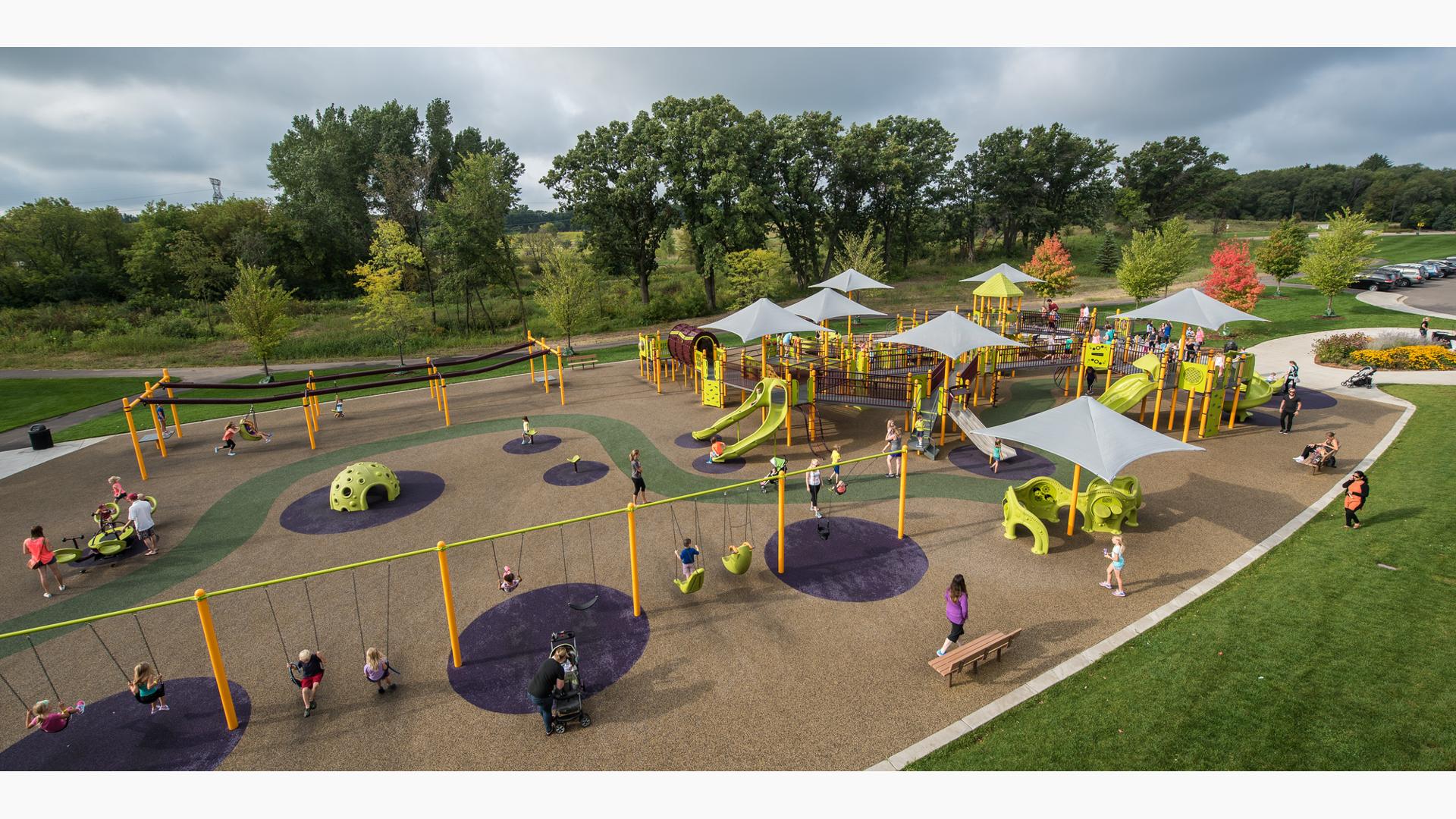 Madison's Place, Woodbury, MN is a a fully inclusive playground featuring the Sway Fun® Glider,  interactive sensory play panels like the Xylofun Panel®, CoolToppers® shade and ZipKrooz® zipline.