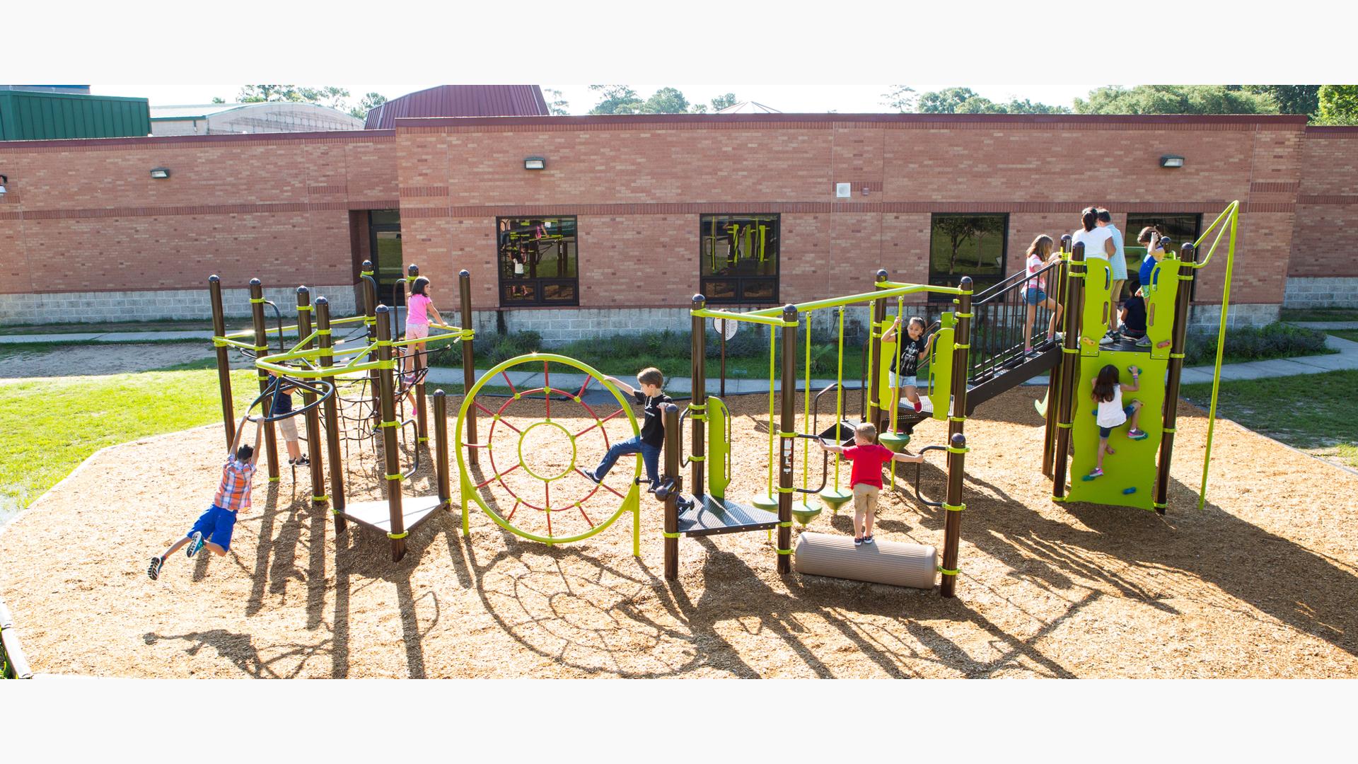 Oak Forest Elementary School, Houston, TX. This playground design features a Swing Out™, Spider Web Climber, Log Roll, and a PlayBooster® playstructure.